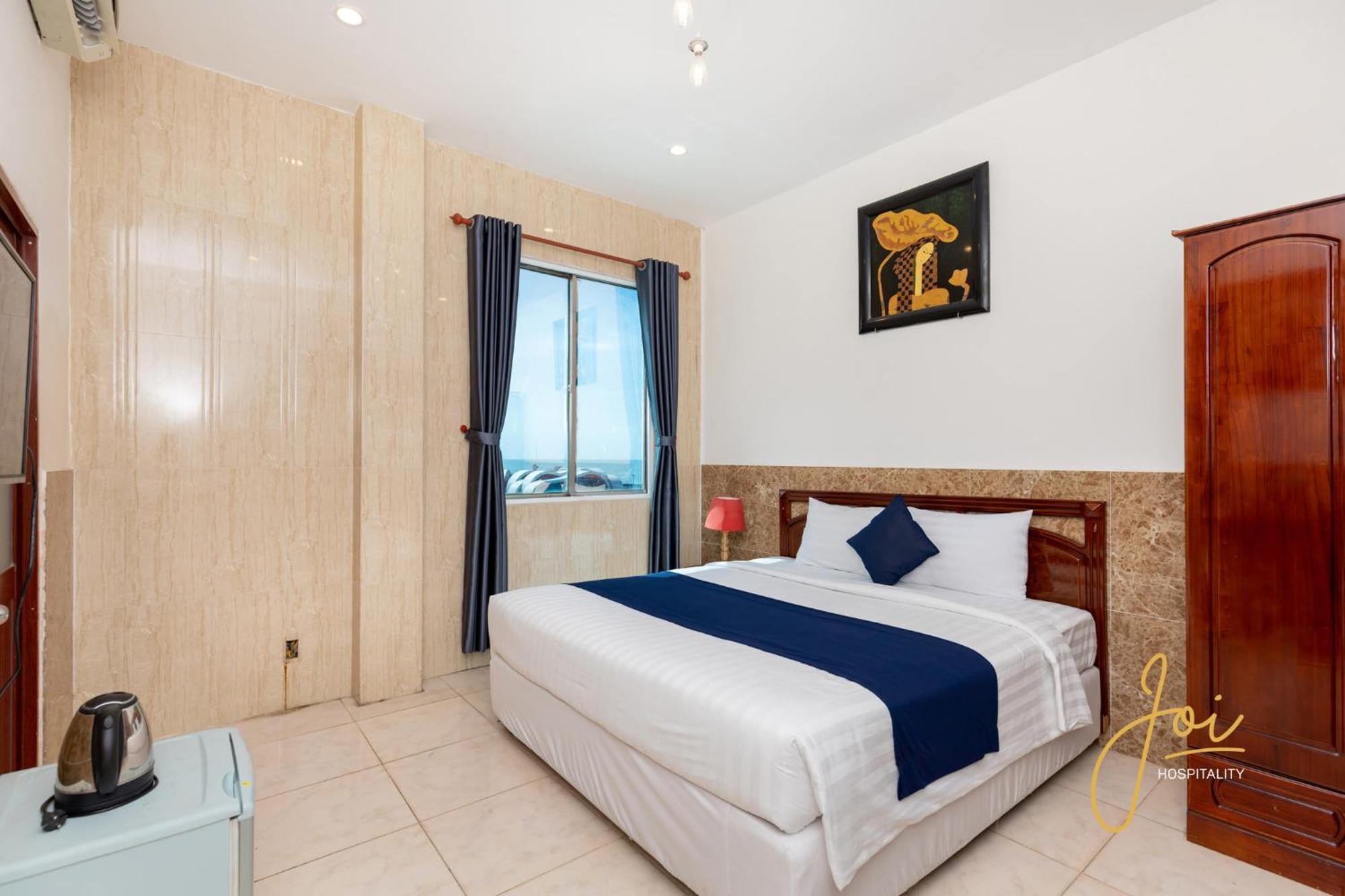 Joi Hospitality - Front Beach Вунгтау Номер фото