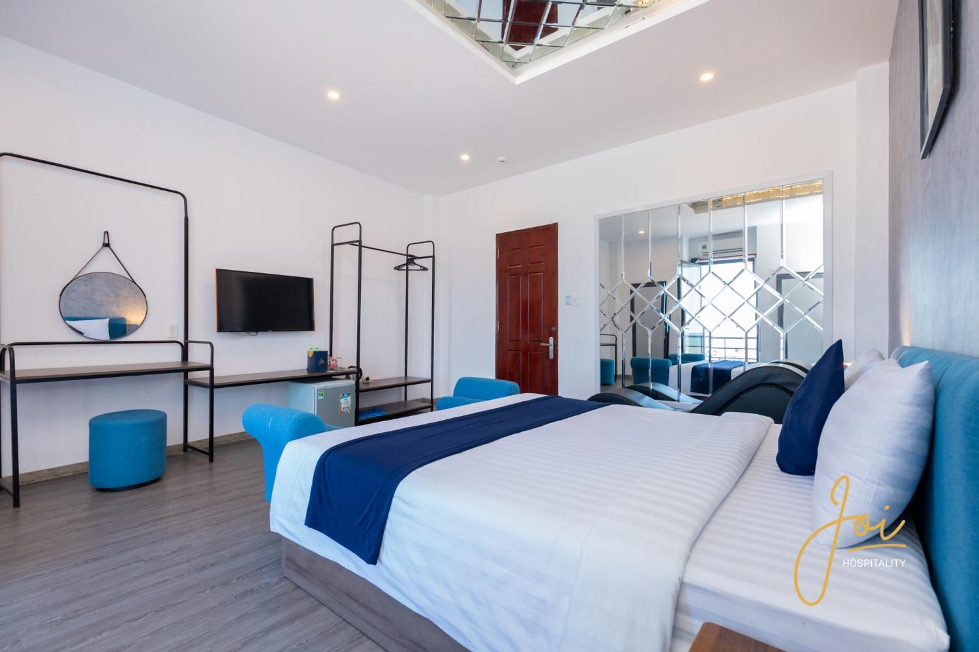 Joi Hospitality - Front Beach Вунгтау Номер фото