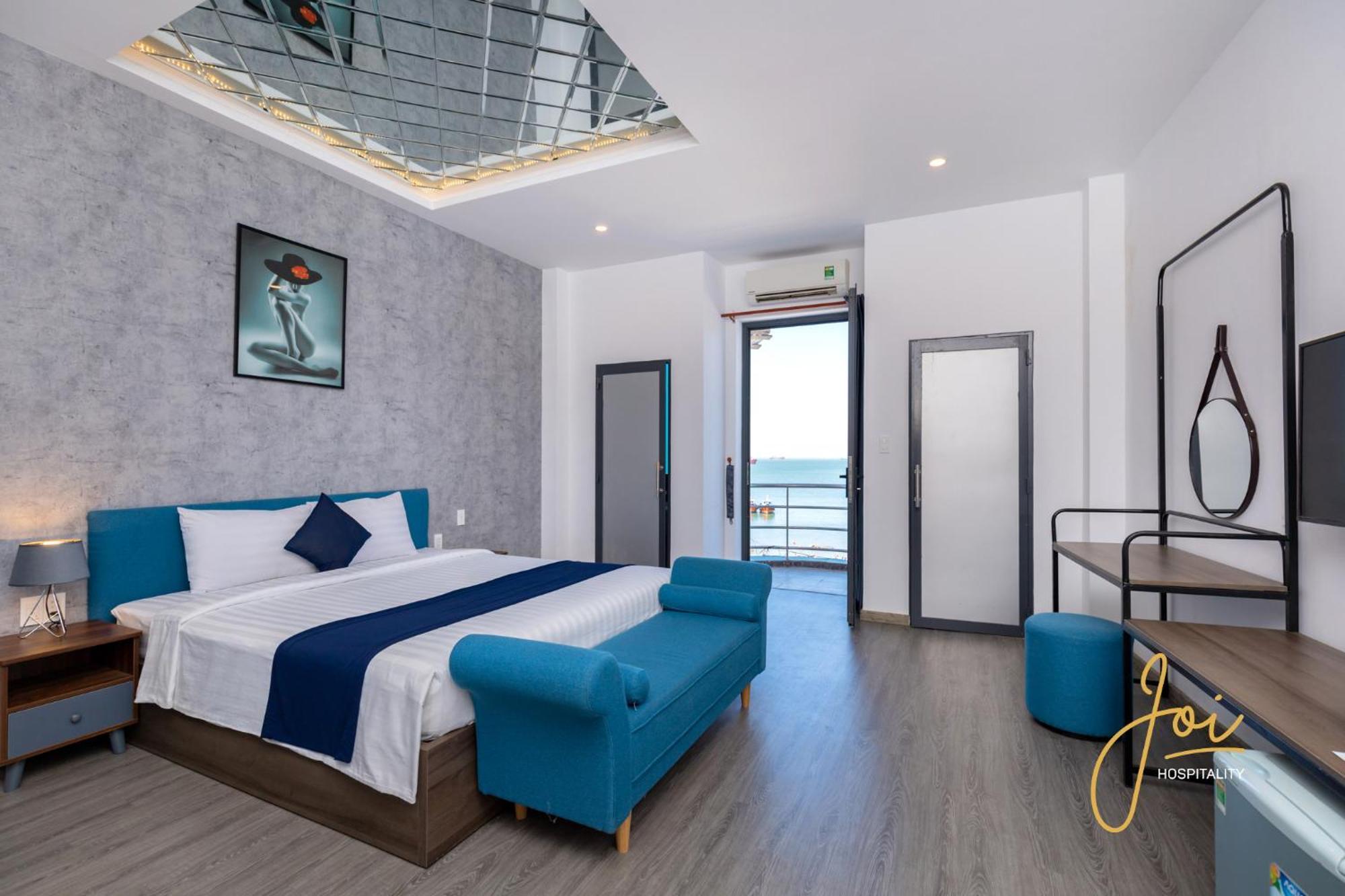 Joi Hospitality - Front Beach Вунгтау Номер фото