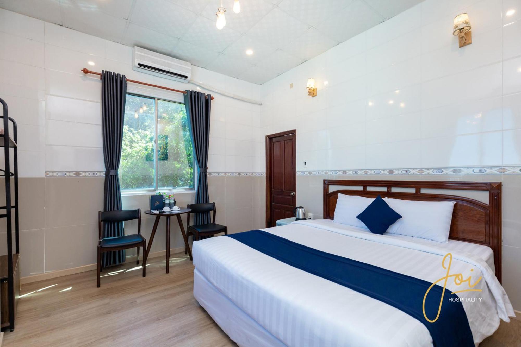 Joi Hospitality - Front Beach Вунгтау Номер фото