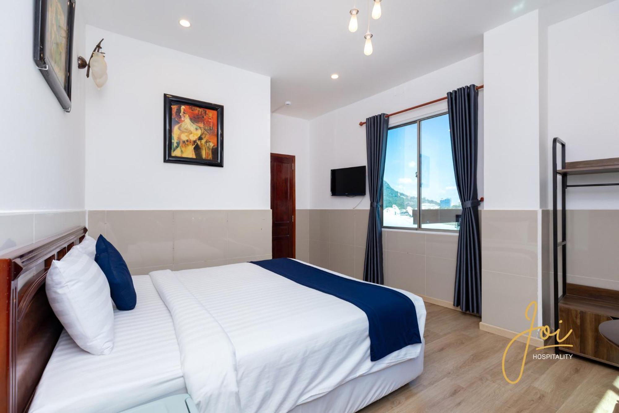 Joi Hospitality - Front Beach Вунгтау Номер фото