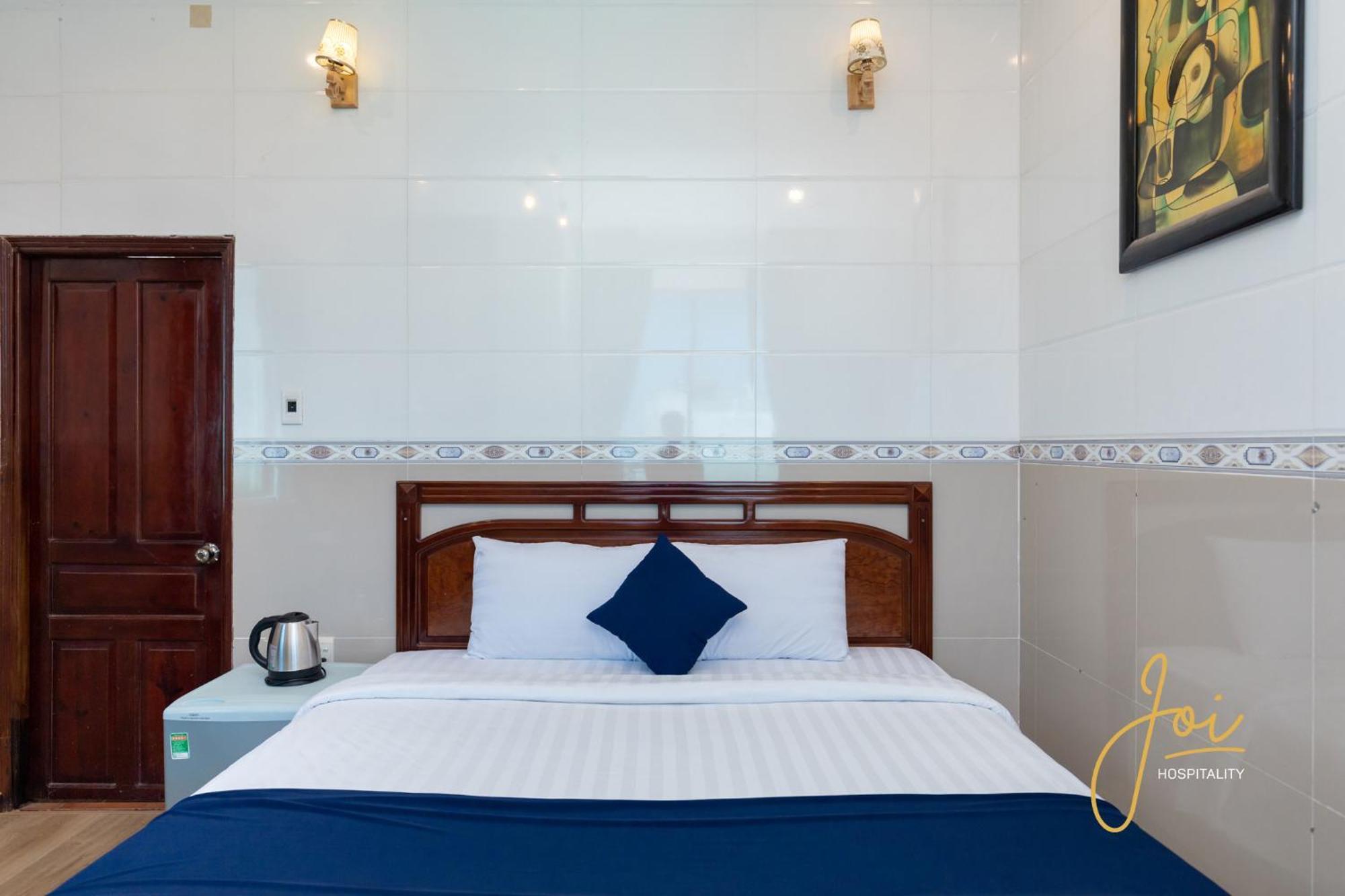 Joi Hospitality - Front Beach Вунгтау Номер фото