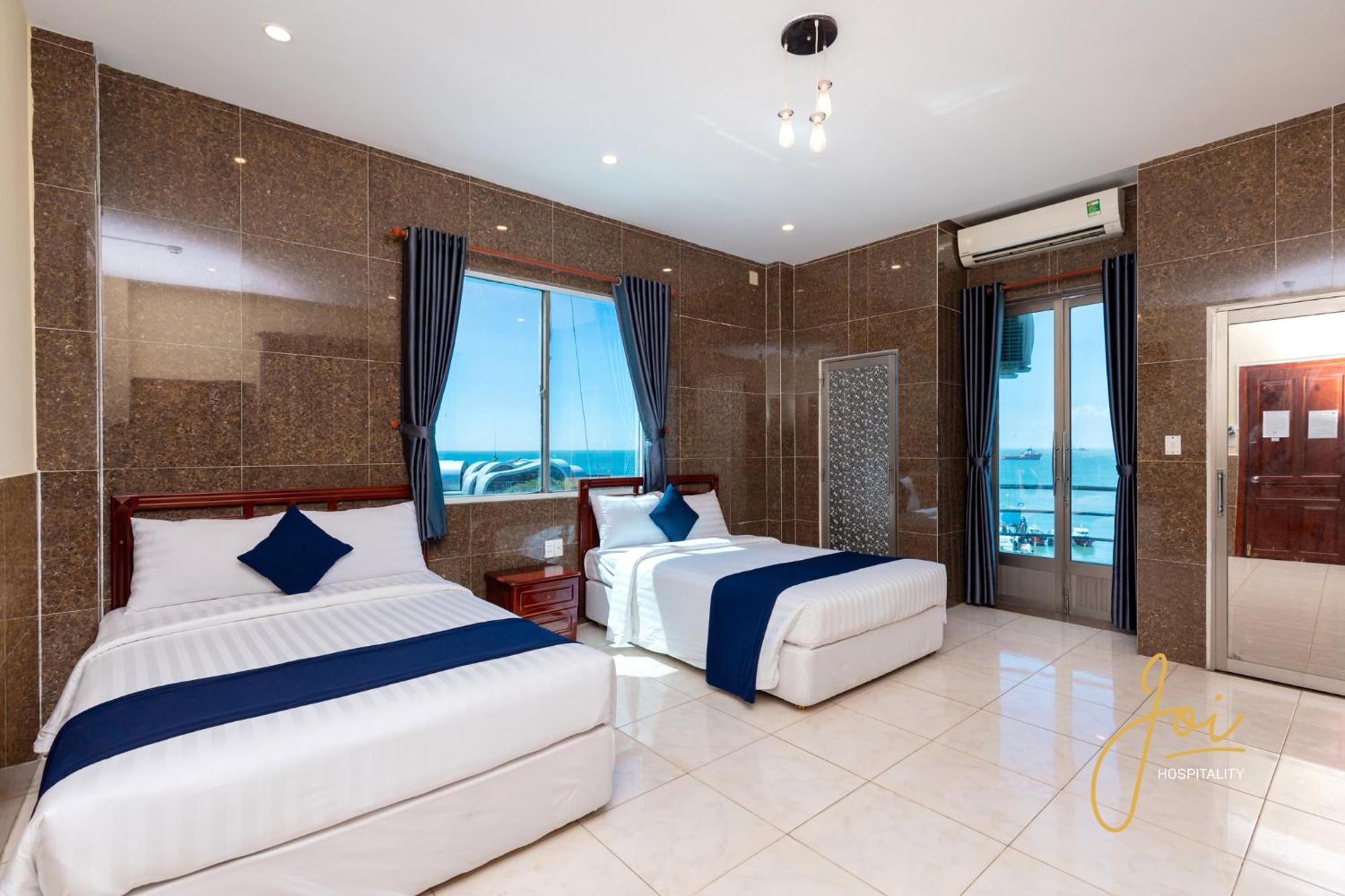 Joi Hospitality - Front Beach Вунгтау Номер фото