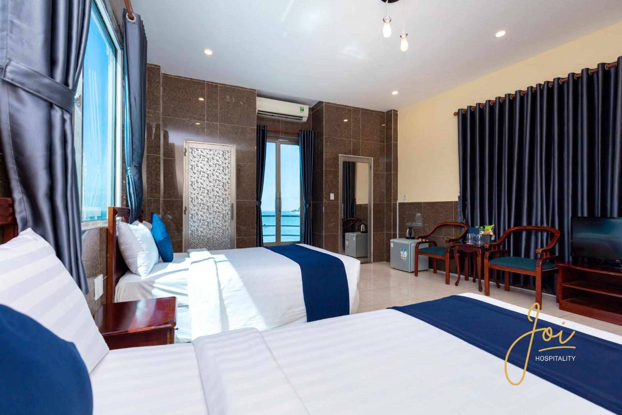 Joi Hospitality - Front Beach Вунгтау Номер фото